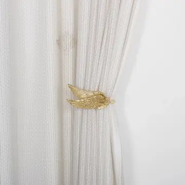 Winged Brass Curtain Holder