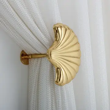 Seashell Polished Brass Curtain Holdback