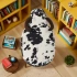 Darphe Kids Black and White Velvet Cow-Shaped Ottoman