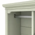 Darphe  green kids wardrobe with a hanging rod and open shelves