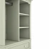 Darphe  green kids wardrobe with a hanging rod and open shelves